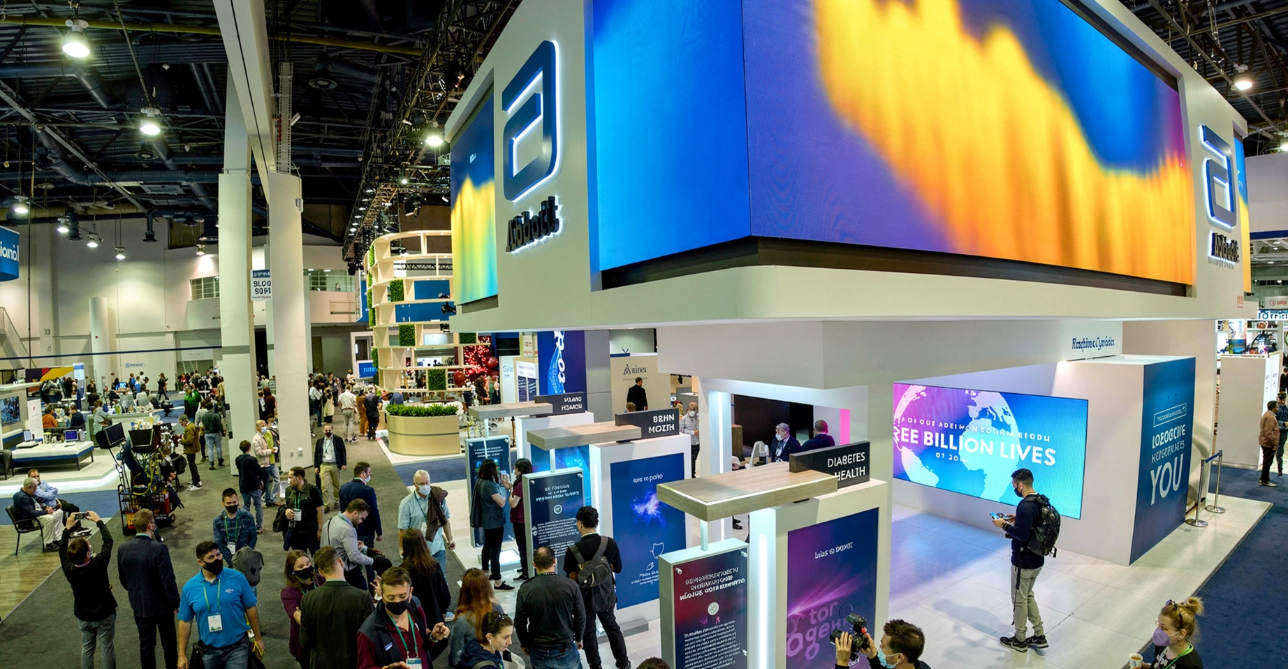 Crowd of visitors in front of the Abbott booth at CES