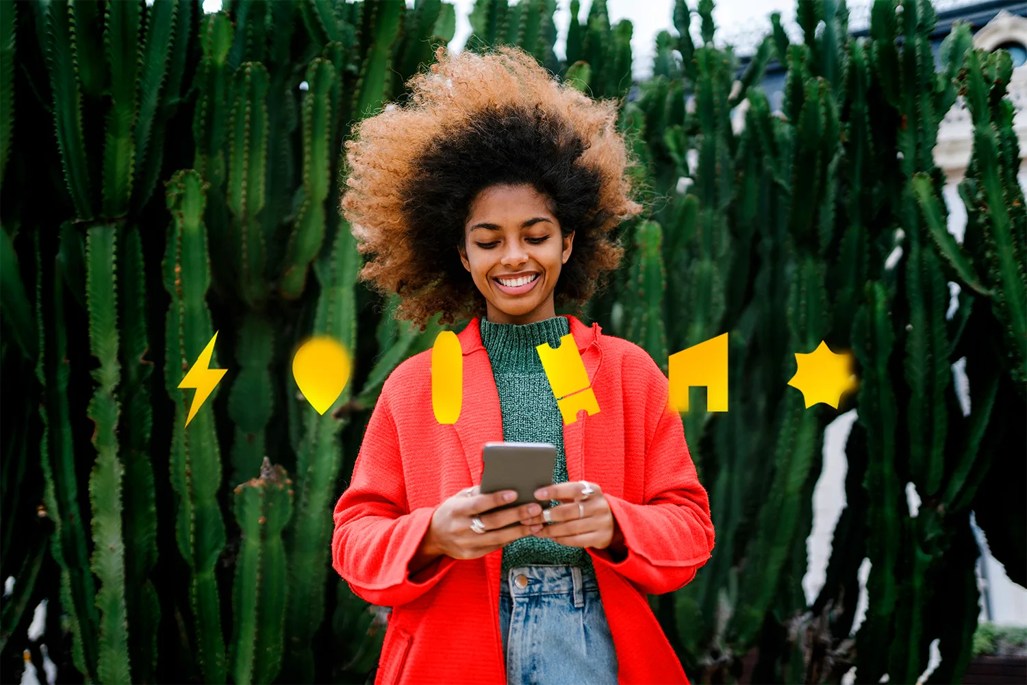 NJOY — woman with a phone in front of cacti