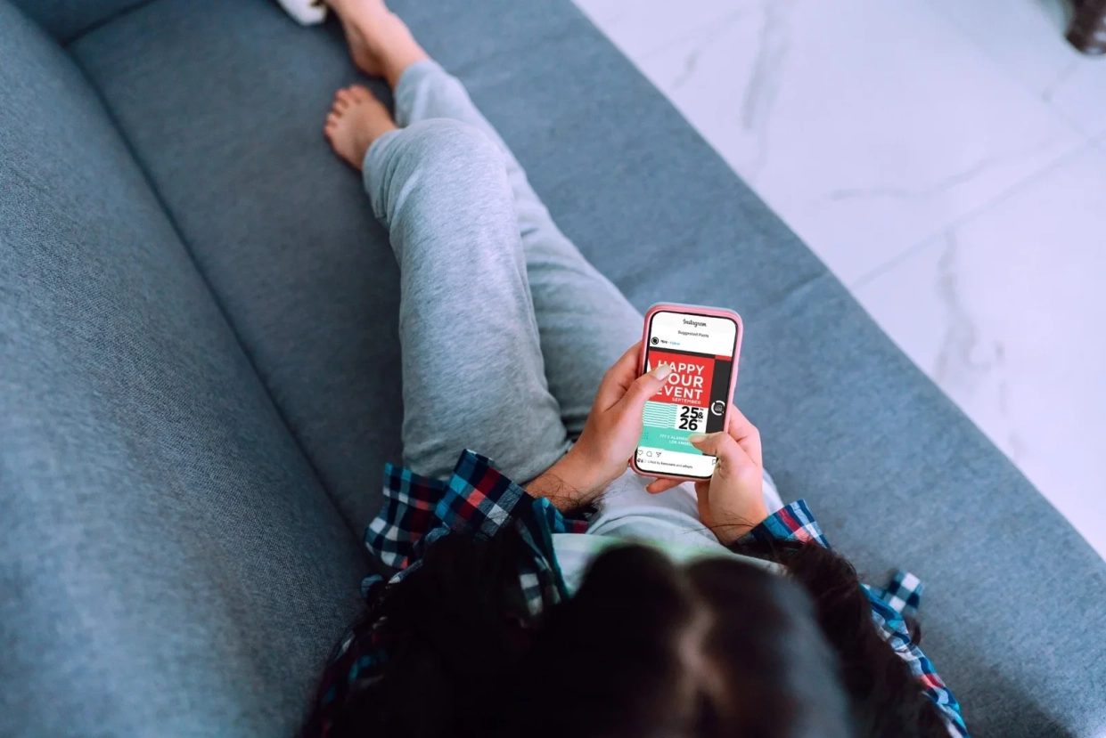 Person on a couch with the NJOY app