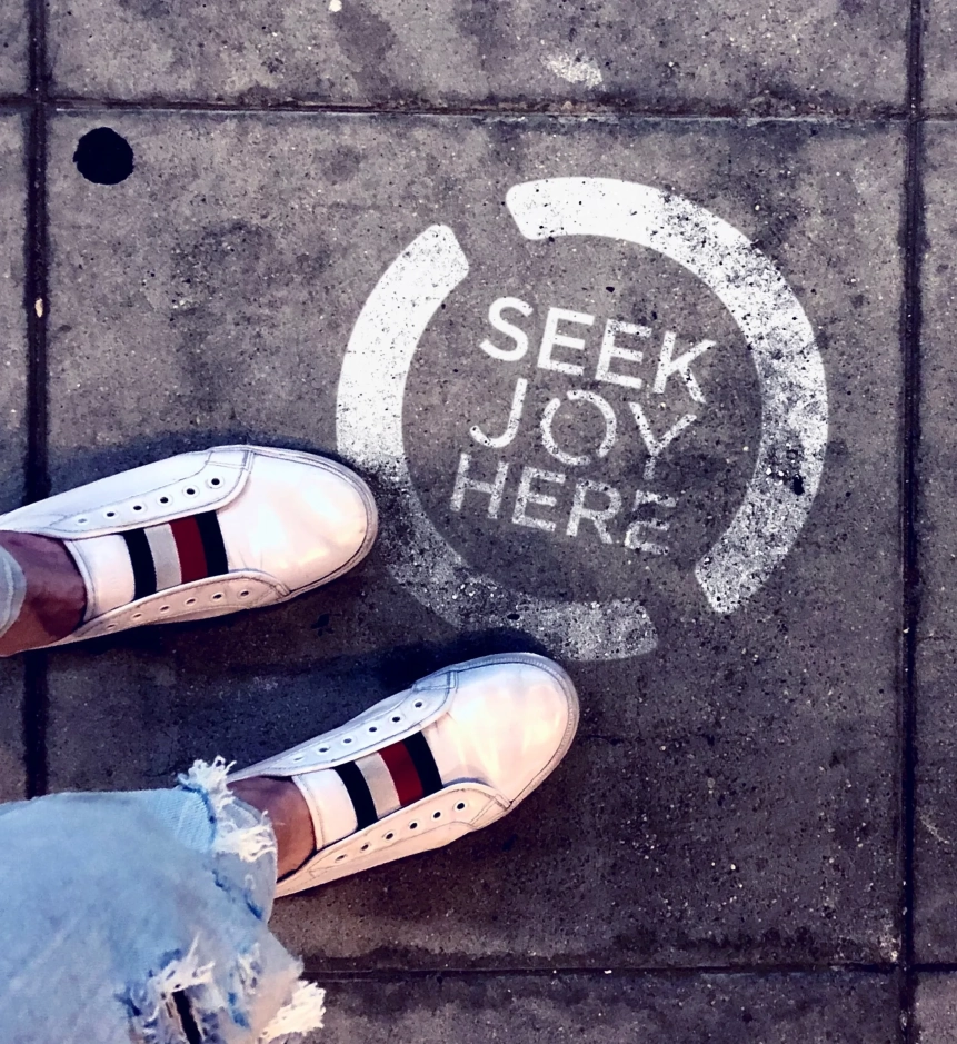 Seek joy here pavement stencil